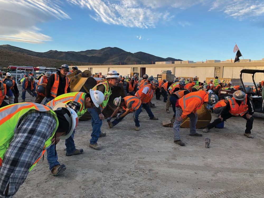 Workers stretching before work