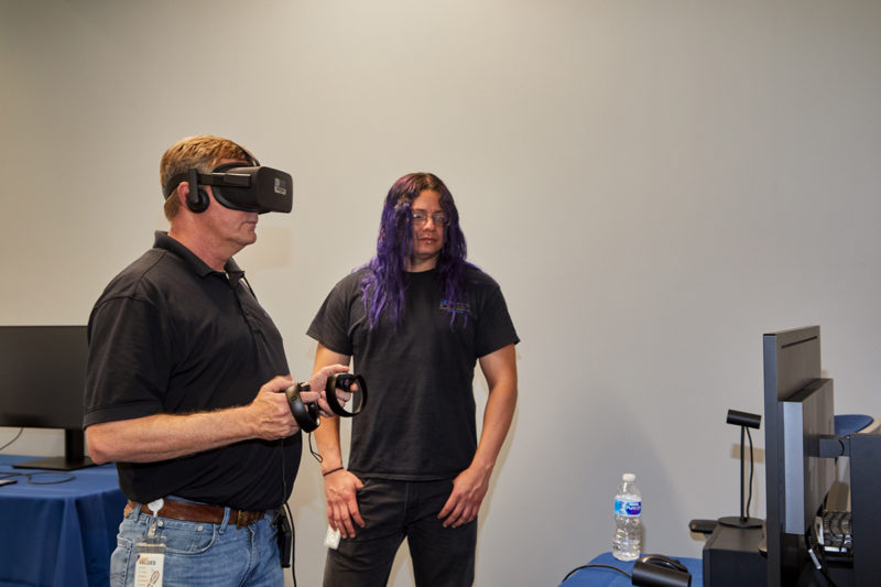 Office staff members using virtual reality