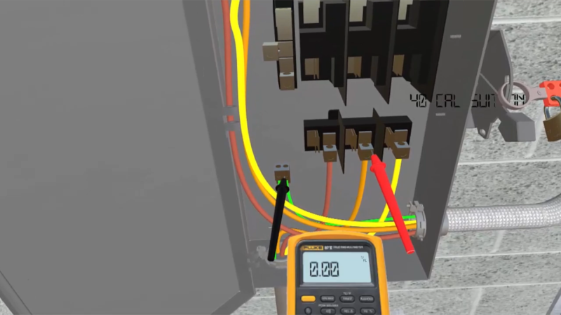 Virtual reality developed by Rosendin's BIM division shows the user how to test voltage on a locked out panel before proceeding with work.