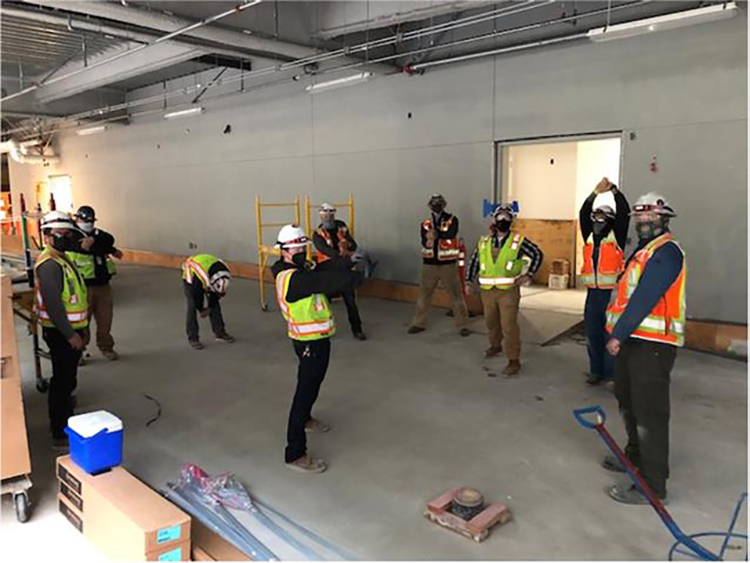 Rosendin's San Jose team performs daily stretch and flex routine